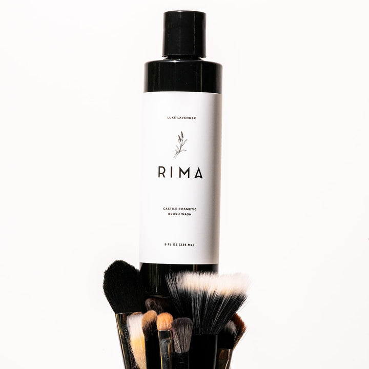 RIMA Cosmetics Castile Cosmetic Brush Wash Luxe Lavender with makeup brushes